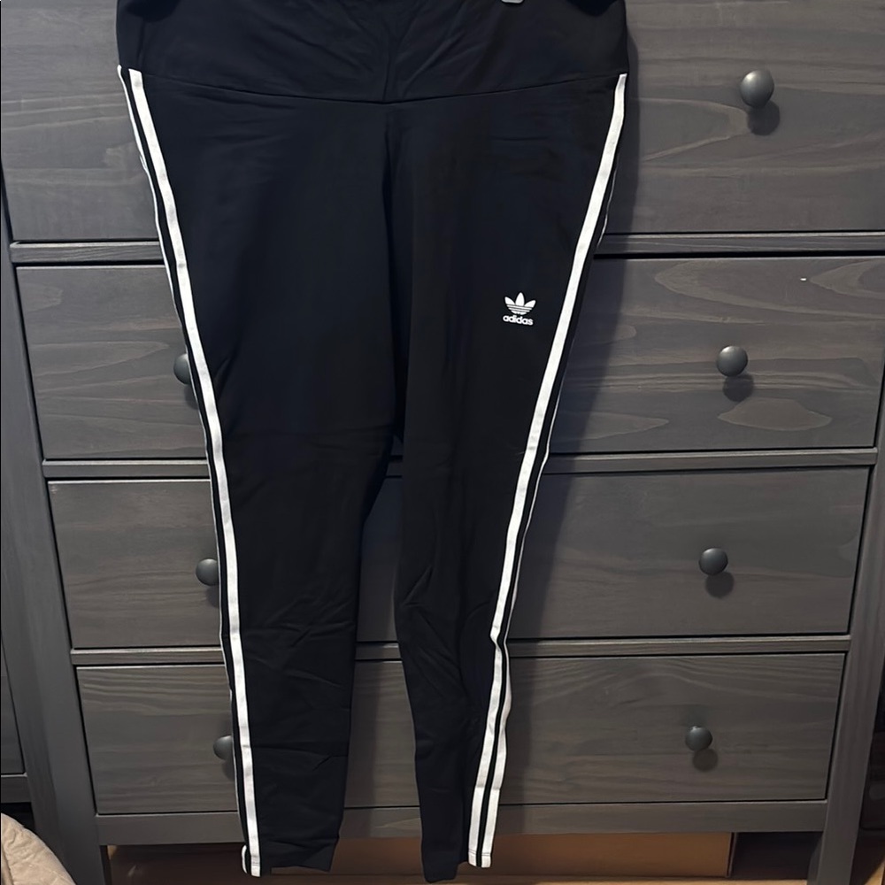Adidas women’s Black leggings with White Stripes